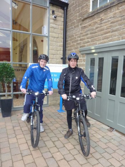 Craig Mitchell and Martin O'Hara with their bikes at Folly Hall