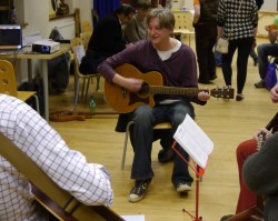 Taking part in the guitar orchestra South West Yorkshire Partnership NHS Foundation Trust
