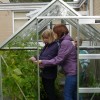 People helping out in the greenhouse South West Yorkshire Partnership NHS Foundation Trust
