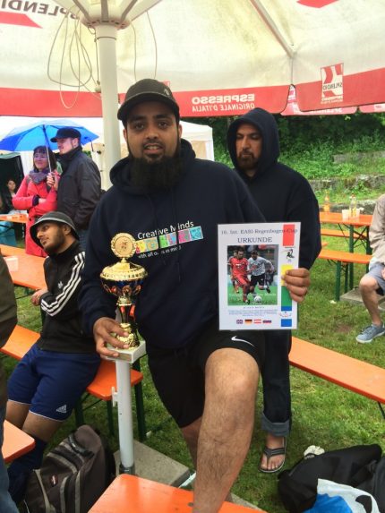 Habib with his trophy and certificate for the third best goalkeeper at the tournament