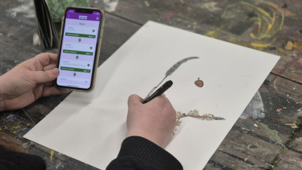 Image of someone using the Create & Bloom app.
