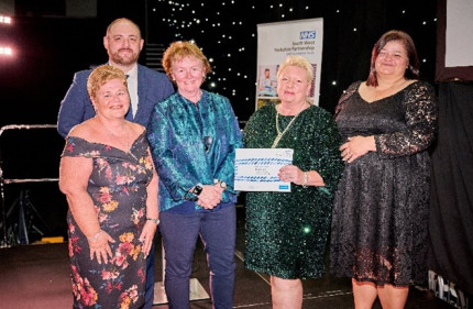 Photo of volunteer service at Excellence awards