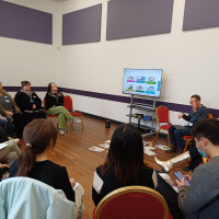 Recovery College Hong Kong delegation visit - group sitting in discussion