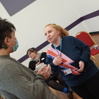 Recovery College Hong Kong delegation visit - two people talking