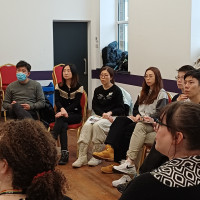 Recovery College Hong Kong delegation visit - group sitting in discussion