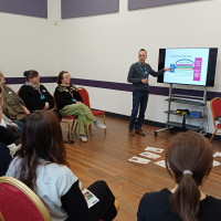 Recovery College Hong Kong delegation visit - person presenting to group