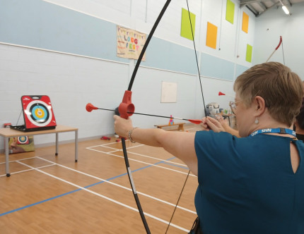 Someone doing archery