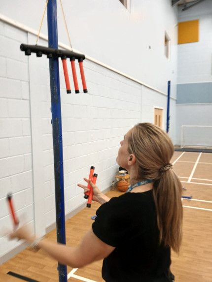 Someone playing a catching game